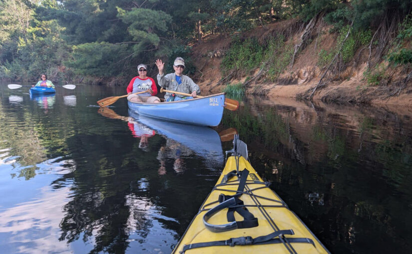 Kayaks and canoe on the Fox River, WI - happy paddling